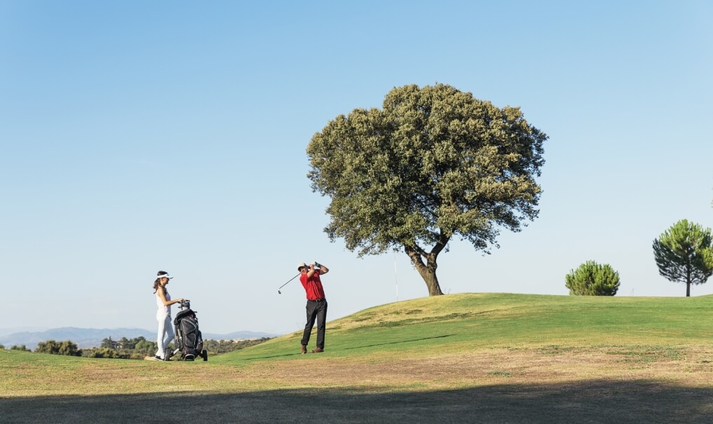 golfer-and-caddie-playing-golf-HP67A39